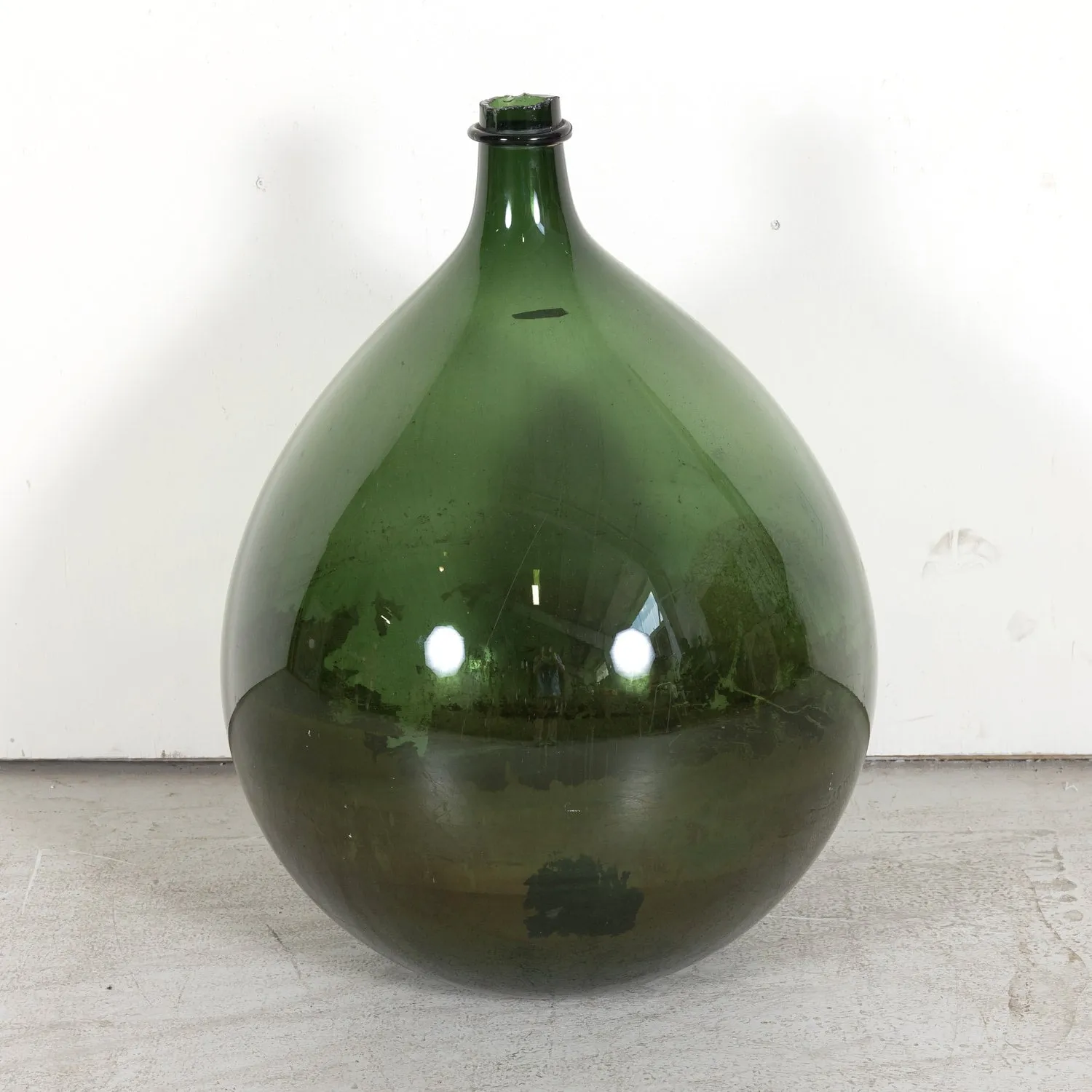 Grand 19th Century French Handblown Dark Green Glass Demijohn or Dame Jeanne Bottle